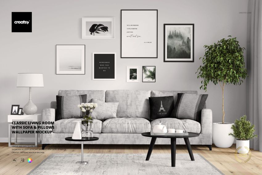 PSD mockup of a stylish living room showing a gray sofa, assorted pillows, minimalist wall decor, and greenery.