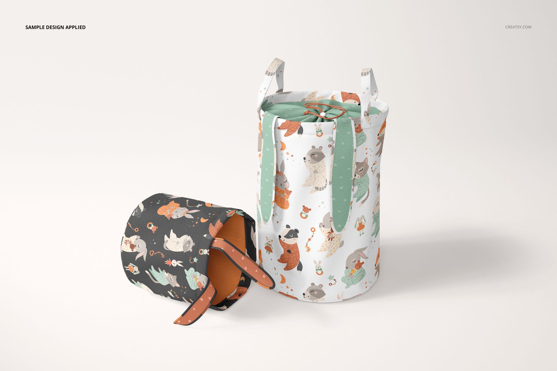 Kids storage baskets mockup showing two fabric bins with playful animal prints, displayed from a front angle.