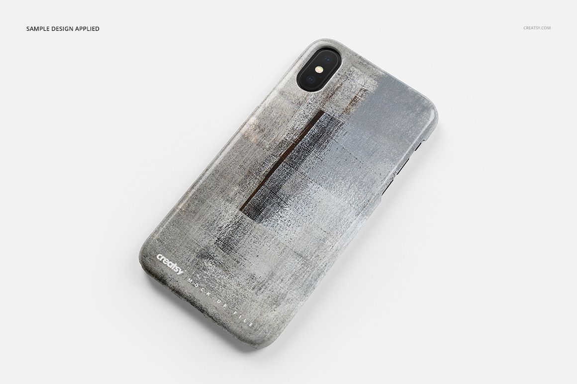 Angled view of an iPhone X plastic case mockup featuring a rough, gray and black painted pattern on a white background.