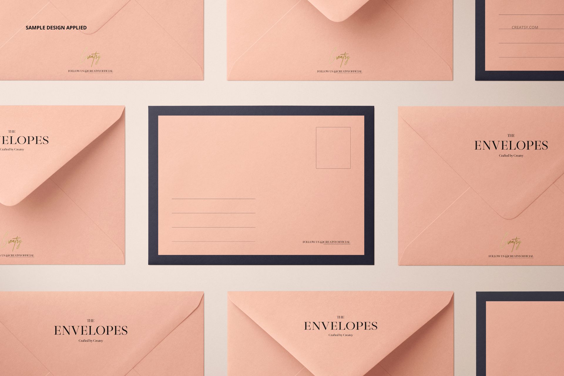 Stationery mockup showing multiple peach C6 envelopes, including one with a black border and address fields.