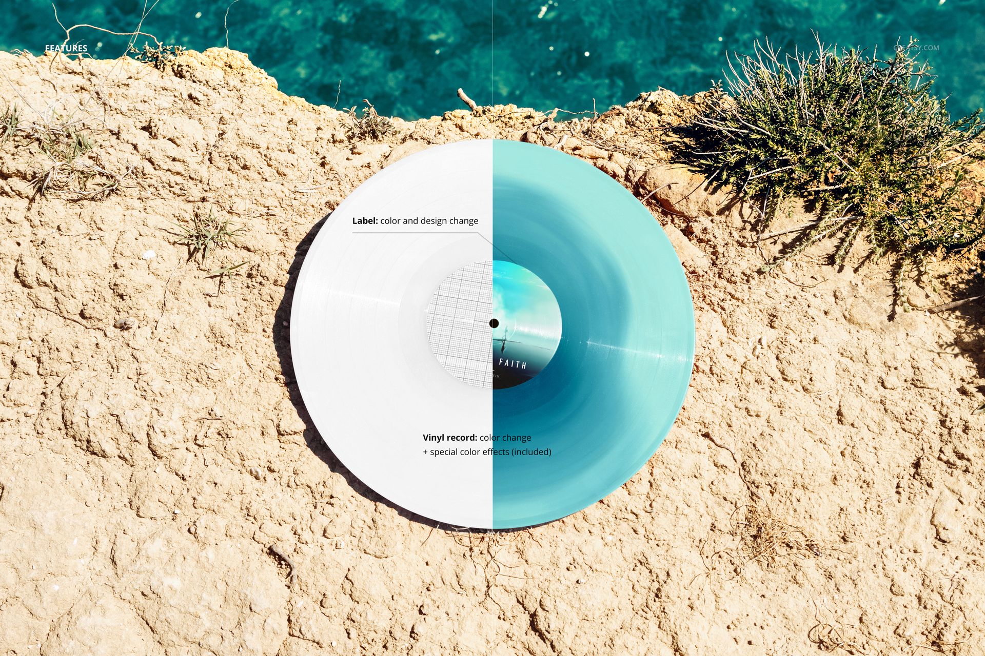 Vinyl record mockup placed on a rocky seashore with clear turquoise water in the background, top view.