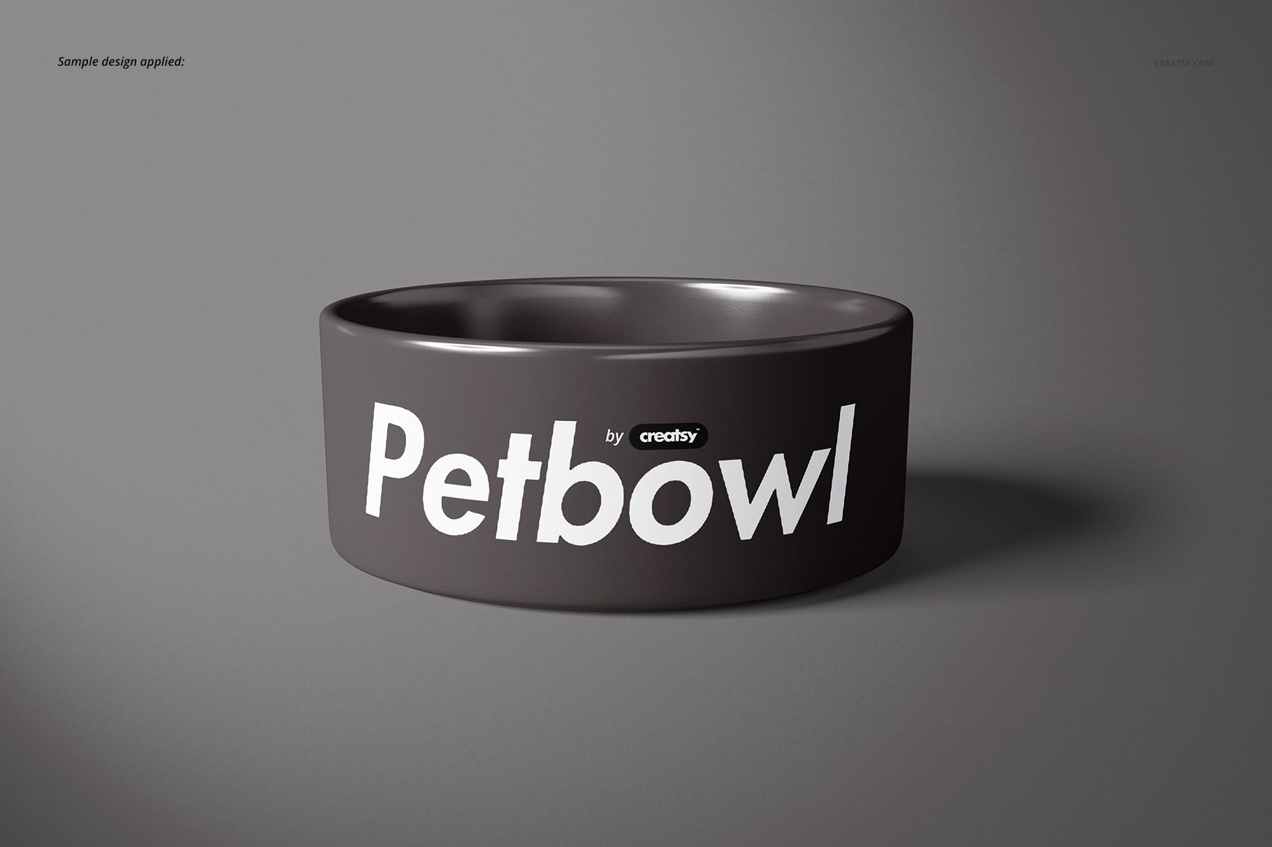 Front view of a round pet bowl mockup with a dark gray exterior and bold white text on a plain gray background.