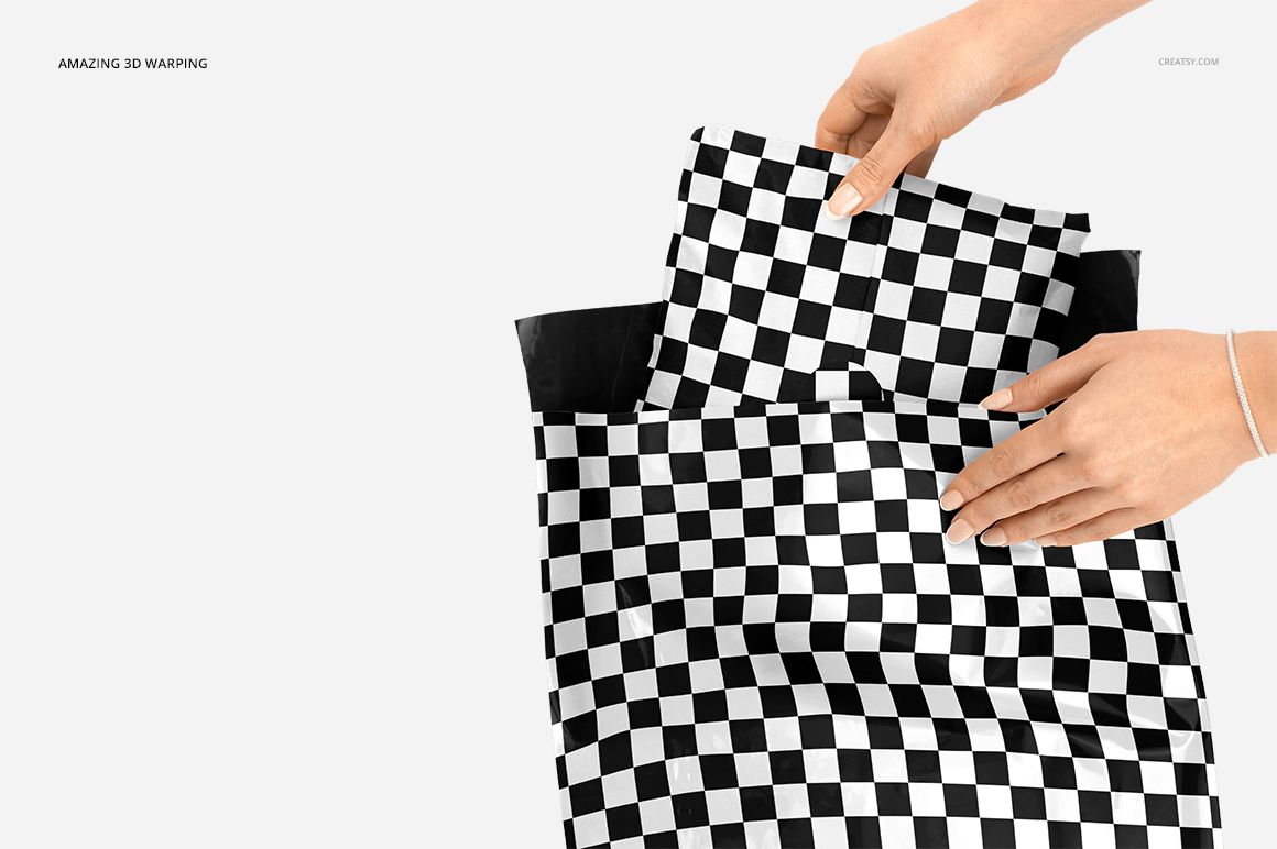 Front view of hands holding and inserting a smaller checkered mailing bag into a larger bag, mockup scene with neutral background.