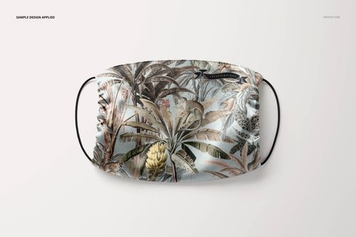 Silk face mask mockup featuring a detailed plant and foliage design, shown from above with elastic ear straps.