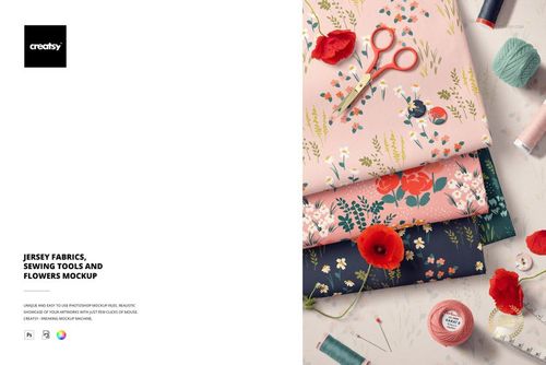 PSD mockup showing stacked jersey fabrics in pink and navy, decorated with flowers, scissors, and sewing accessories.
