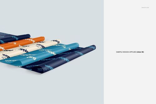 Front view of several sheets of wrapping tissue paper mockup in blue, orange, and cream colors with printed patterns.
