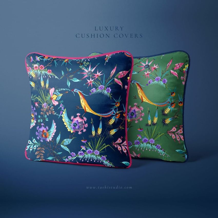 Silk cushion mockup set featuring two square pillows with colorful floral and bird patterns on dark blue and green backgrounds.