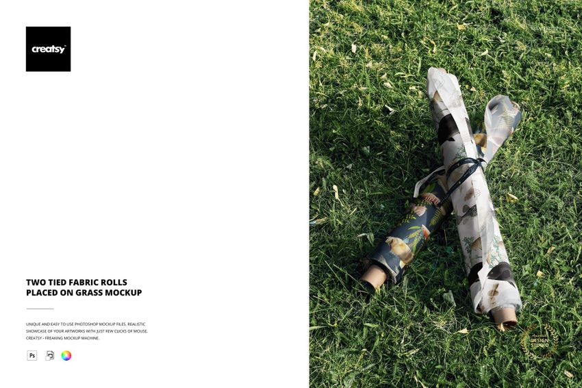 Two Tied Fabric Rolls Placed on Grass Mockup - mockup screenshot 1