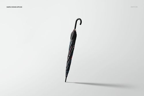 Closed umbrella mockup with a curved black handle, featuring a dark patterned design, shown on a light background.