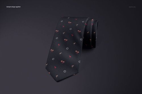 Rolled dark tie featuring small red and beige motifs, shown on a smooth, shadowed surface in a mockup scene.