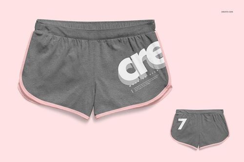 Women's shorts PSD mockup set displaying gray shorts with pink edging, front and back views, on a pale pink surface.
