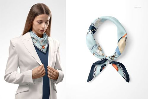 Silk scarf mockup featuring a folded scarf with chain and pendant patterns in light blue tones, shown on a white background.