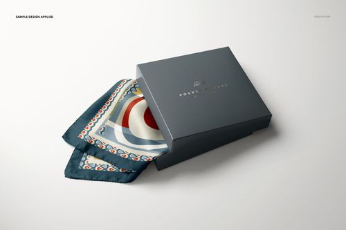 PSD mockup of a folded pocket square with bold circular design next to an elegant gray packaging box.