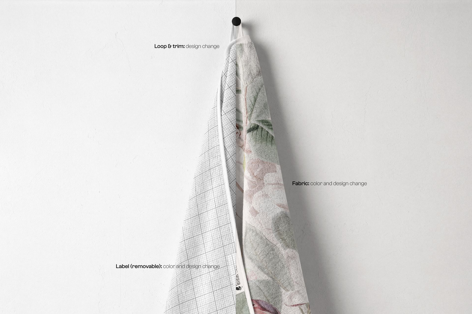 Two towels hanging on a wall, one with a grid pattern and the other with a floral design, shown in a mockup setting.
