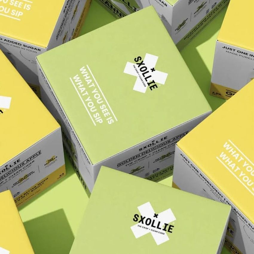 Square box mockup featuring multiple packaging boxes arranged on a light green surface, with bold text overlays and minimalist design.