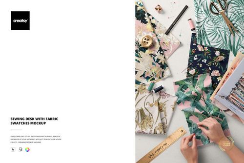 PSD mockup showing a creative workspace with floral and leafy fabric swatches, sewing supplies, and crafting accessories.
