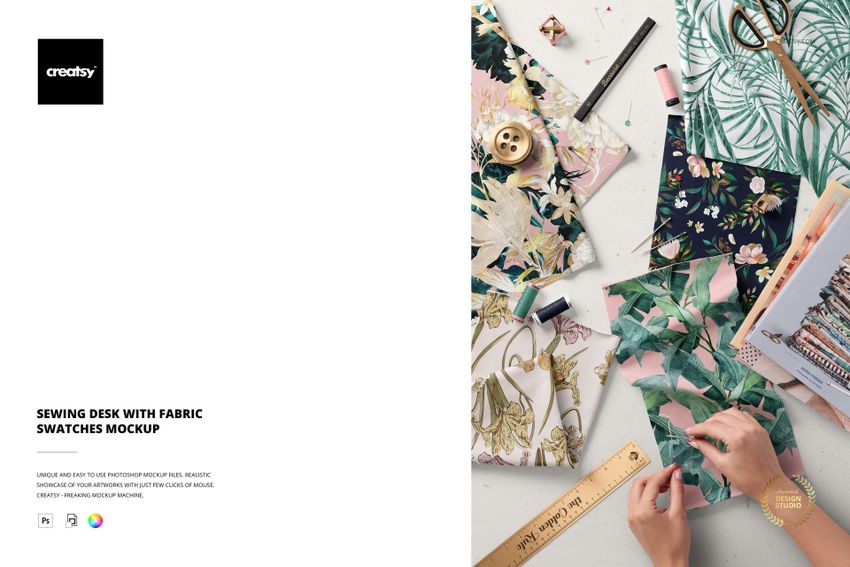 PSD mockup showing a creative workspace with floral and leafy fabric swatches, sewing supplies, and crafting accessories.