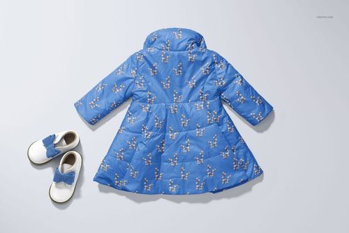 PSD mockup of a blue baby coat with a floral print, shown from the back next to white shoes with blue bows.