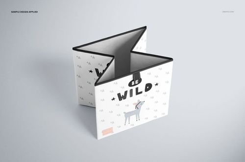 Mockup of a folding storage box featuring a white surface, black edges, and illustrated animal designs, viewed from above.