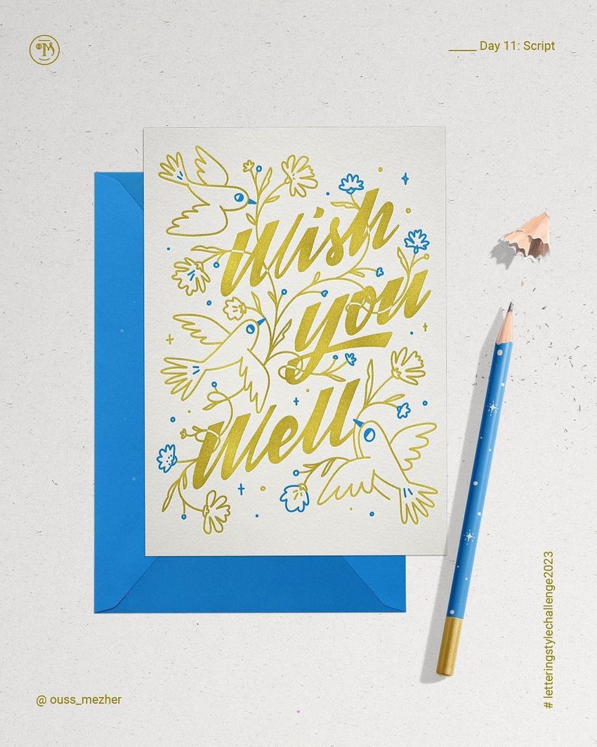 Stationery mockup featuring a greeting card with gold and blue handwritten text and floral illustrations on a blue envelope.
