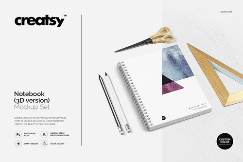 Front view of a notebook mockup set featuring a white cover with abstract shapes, surrounded by stationery items.