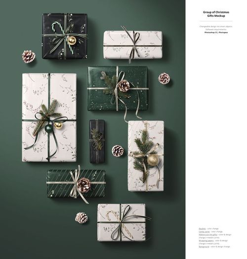 Christmas gift mockup set featuring variously sized boxes in holiday wrapping with ribbons and natural festive accents, overhead perspective.