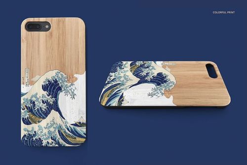 Mockup of a wooden phone case with a Japanese wave illustration, displayed upright and lying flat on a blue backdrop.