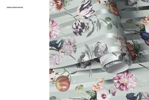 PSD mockup of paper wallpaper with a botanical design and muted colors, displayed partially unrolled on a flat surface.