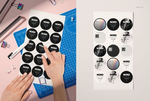 Two sheets of round stickers featuring geometric and abstract designs, displayed from above in a mockup scene.