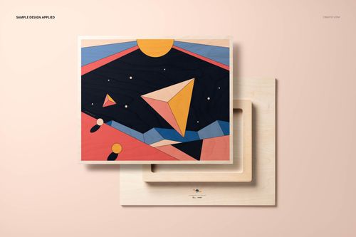 Front view of a plywood wall art mockup featuring vibrant geometric shapes and a dark background on a neutral scene.