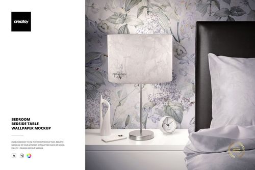 Bedroom mockup showing a metallic lamp, patterned wallpaper, and minimalistic decor on a white bedside table next to a bed.