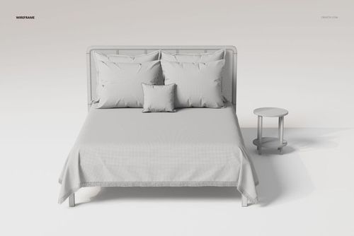 Front view of a rattan headboard bed with a fringed bedspread, three pillows, and a round side table in a minimal setting.