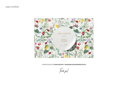 Front view of a leather handbag mockup featuring a colorful floral pattern with green stems and various flowers.