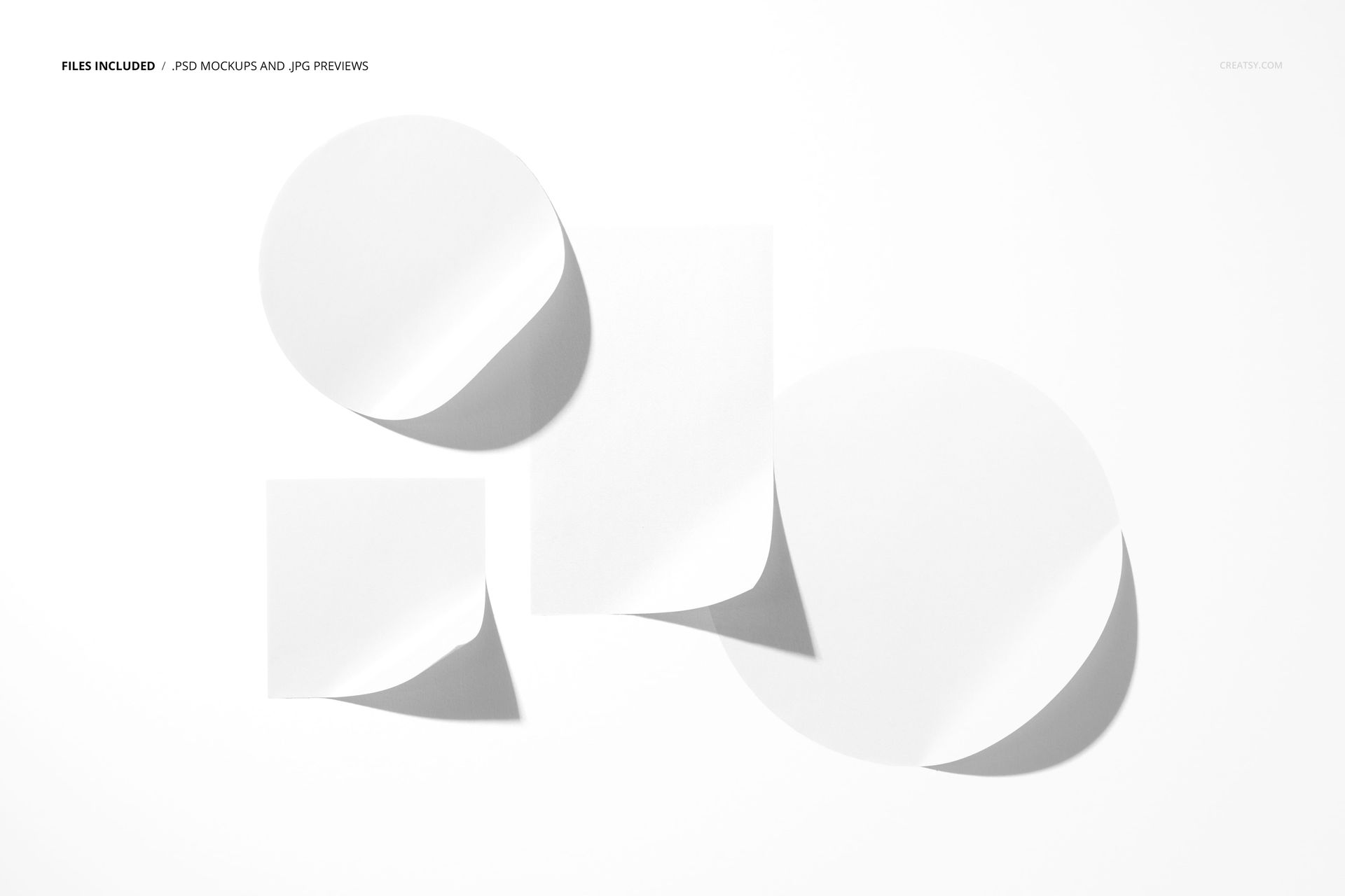 PSD mockup displaying assorted sticker shapes, including round and square designs, arranged on a bright white backdrop.