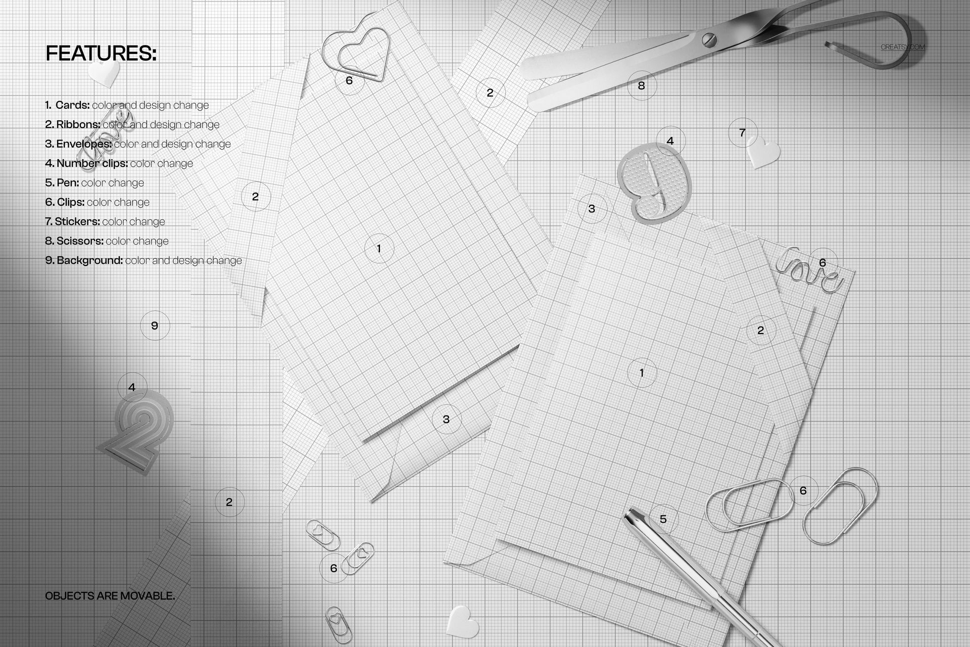 Top view of Valentine’s Day greeting card stationery mockup with envelopes, ribbons, and paperclips on a grid background.