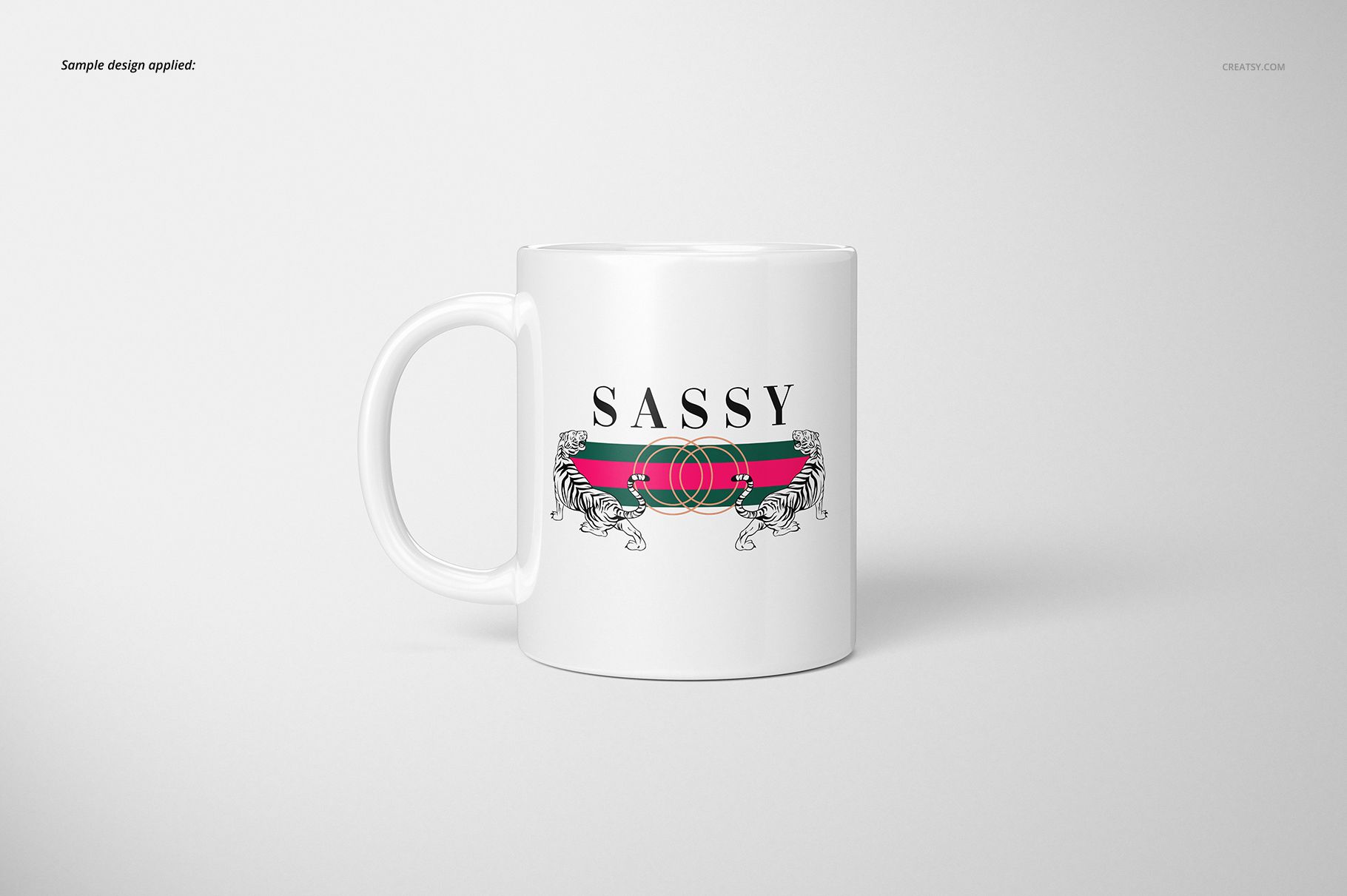 White 11oz mug with a bold 'SASSY' text and tiger graphic, shown in a front view on a light gray background.