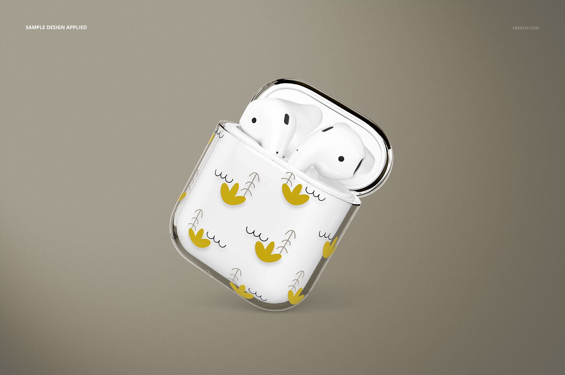 PSD mockup of a clear AirPods case with abstract yellow shapes and gray lines, presented in a floating angled view.