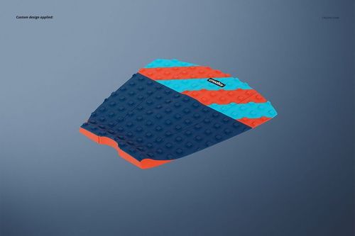 Single surfboard traction pad mockup in blue and orange, displayed from a top angle on a gray gradient backdrop.