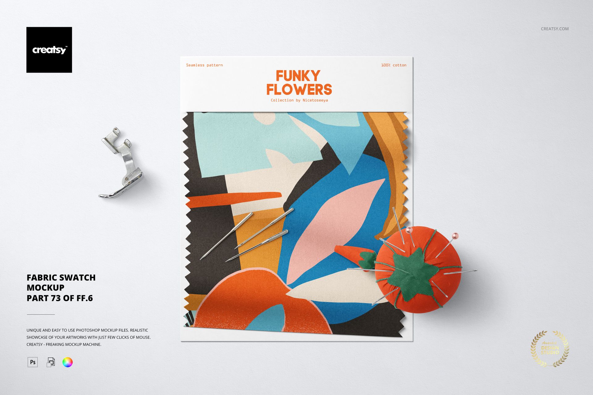 Fabric swatch mockup featuring a colorful abstract pattern, shown from a top view with pins and a pin cushion.