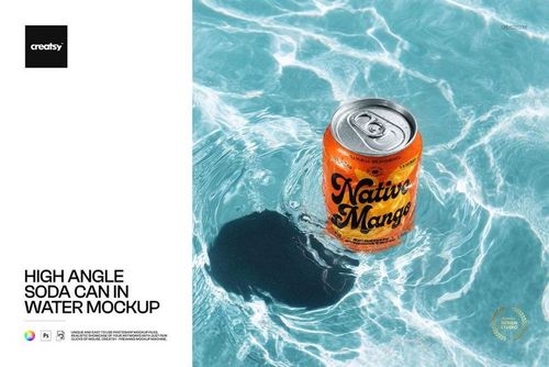 High angle view of an orange soda can floating in clear blue water, showcasing drinkware mockup details.