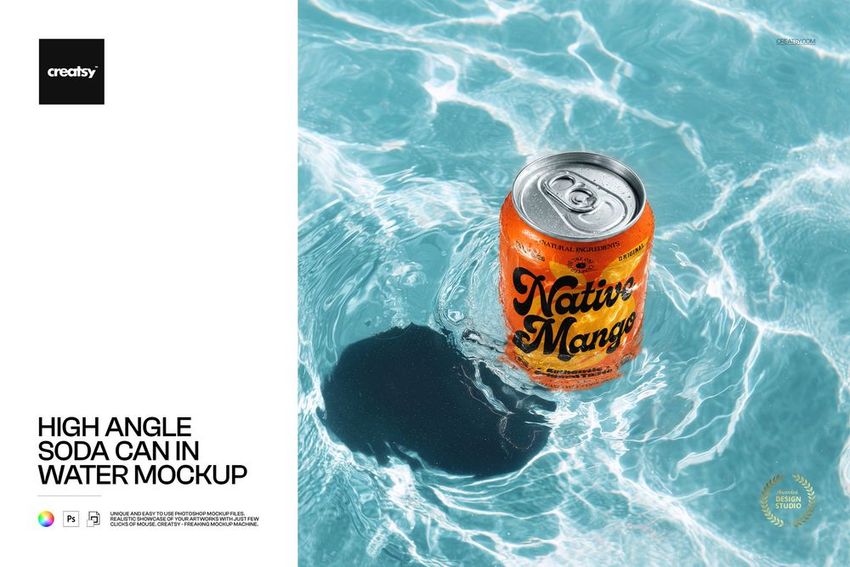 High angle view of an orange soda can floating in clear blue water, showcasing drinkware mockup details.