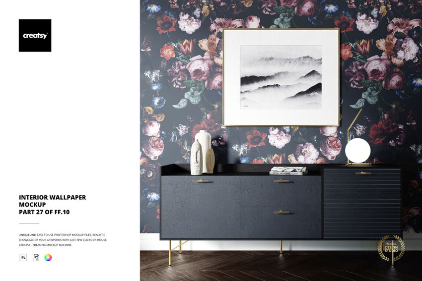 Interior wallpaper mockup showing a floral patterned wall, minimalist black furniture, and decorative framed print.