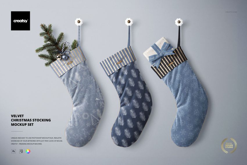 Velvet Christmas stocking PSD mockup set featuring three stockings in varying blue patterns, striped tops, and festive holiday props.