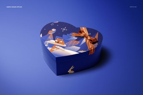 Heart-shaped chocolate box mockup with a whimsical animal illustration and brown ribbon, shown in three-quarter view on a blue background.
