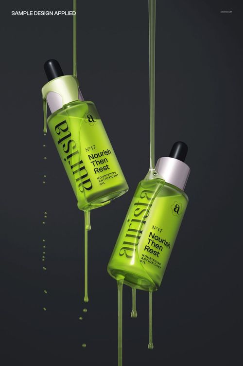Front view of two green serum dropper bottles with running liquid drops on a dark background, PSD mockup.