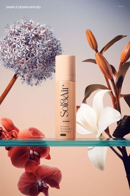 Front view of a cosmetic bottle mockup on a glass shelf with various colorful flowers in the background.