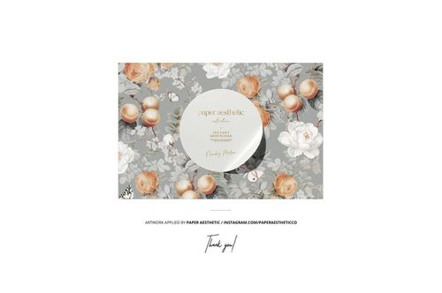 Jersey fabric mockup shown in a detailed close-up, decorated with soft peach and white flowers on gray.