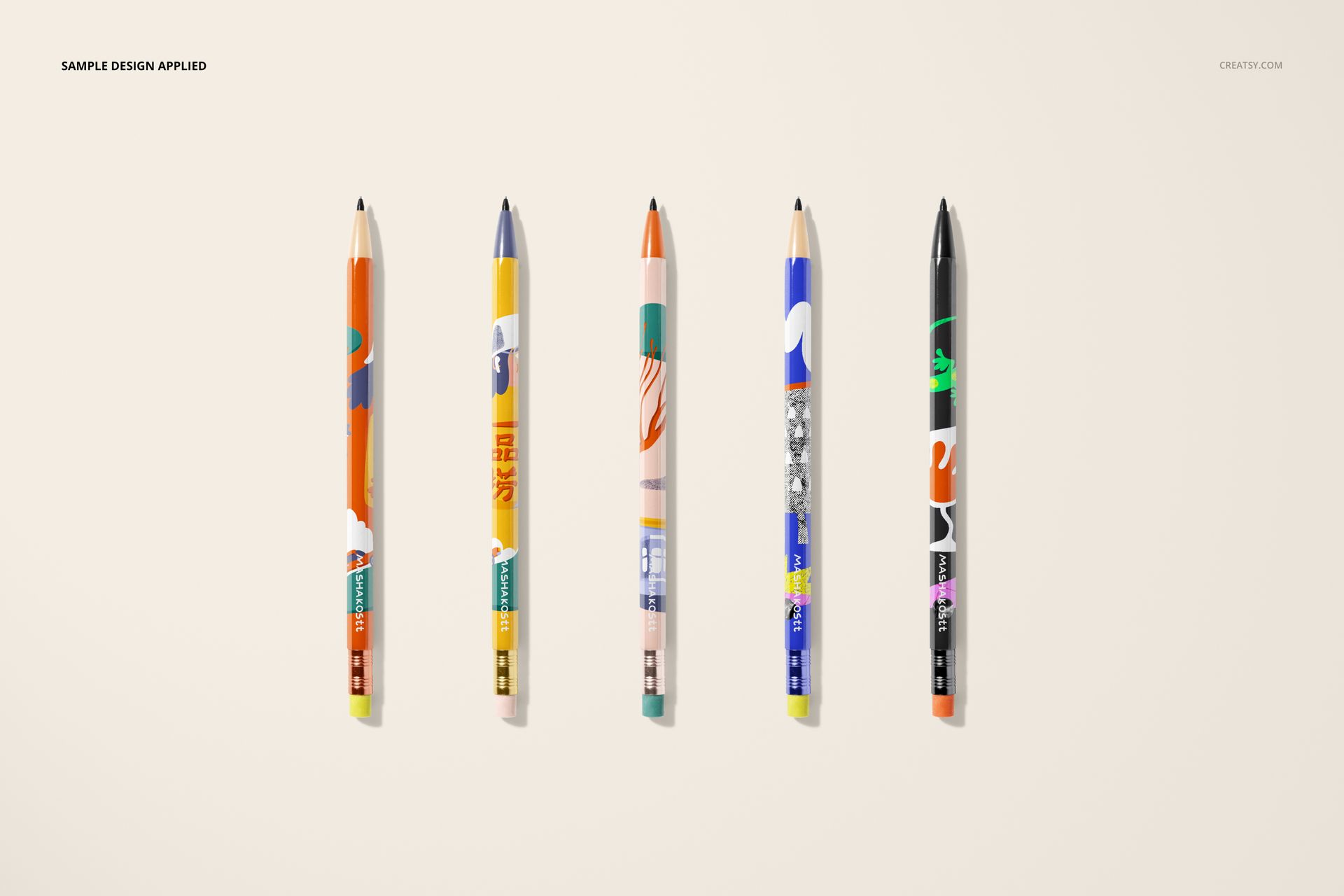 Five spiral ring flip top notebooks with colorful abstract covers arranged in a row on a light background, front view.