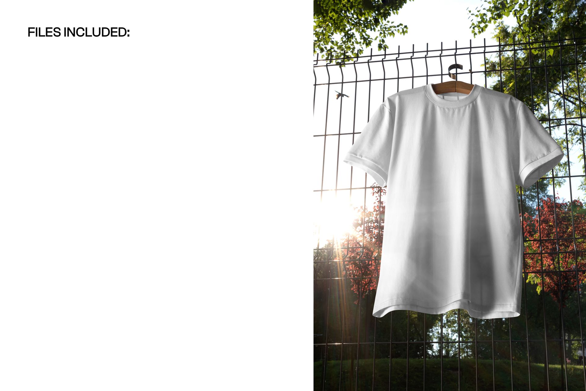 Plain white t-shirt mockup displayed on a hanger outside, sunlit scene with greenery and metal fence in the background.