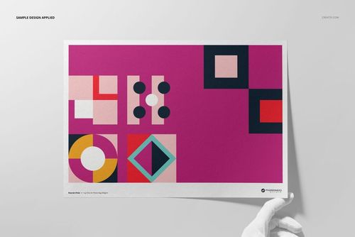 A3 fine art print mockup featuring a geometric abstract design with bold colors, held by a gloved hand on a light background.